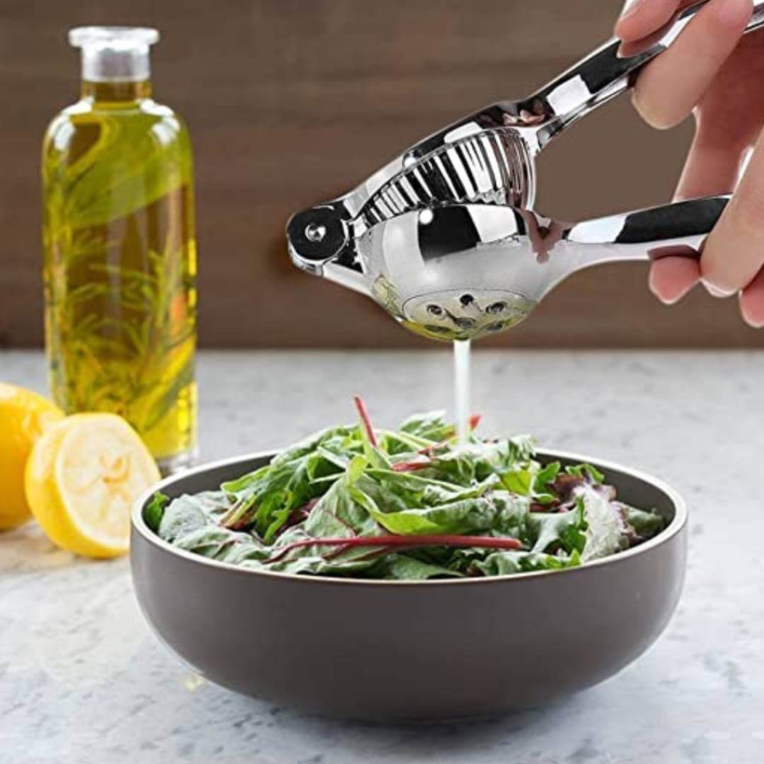 Stainless Steel Finish Heavy Quality Lemon Squeezer With Comfortable Handle For Extracting Lemon Juice. Modern Kitchen Tool.